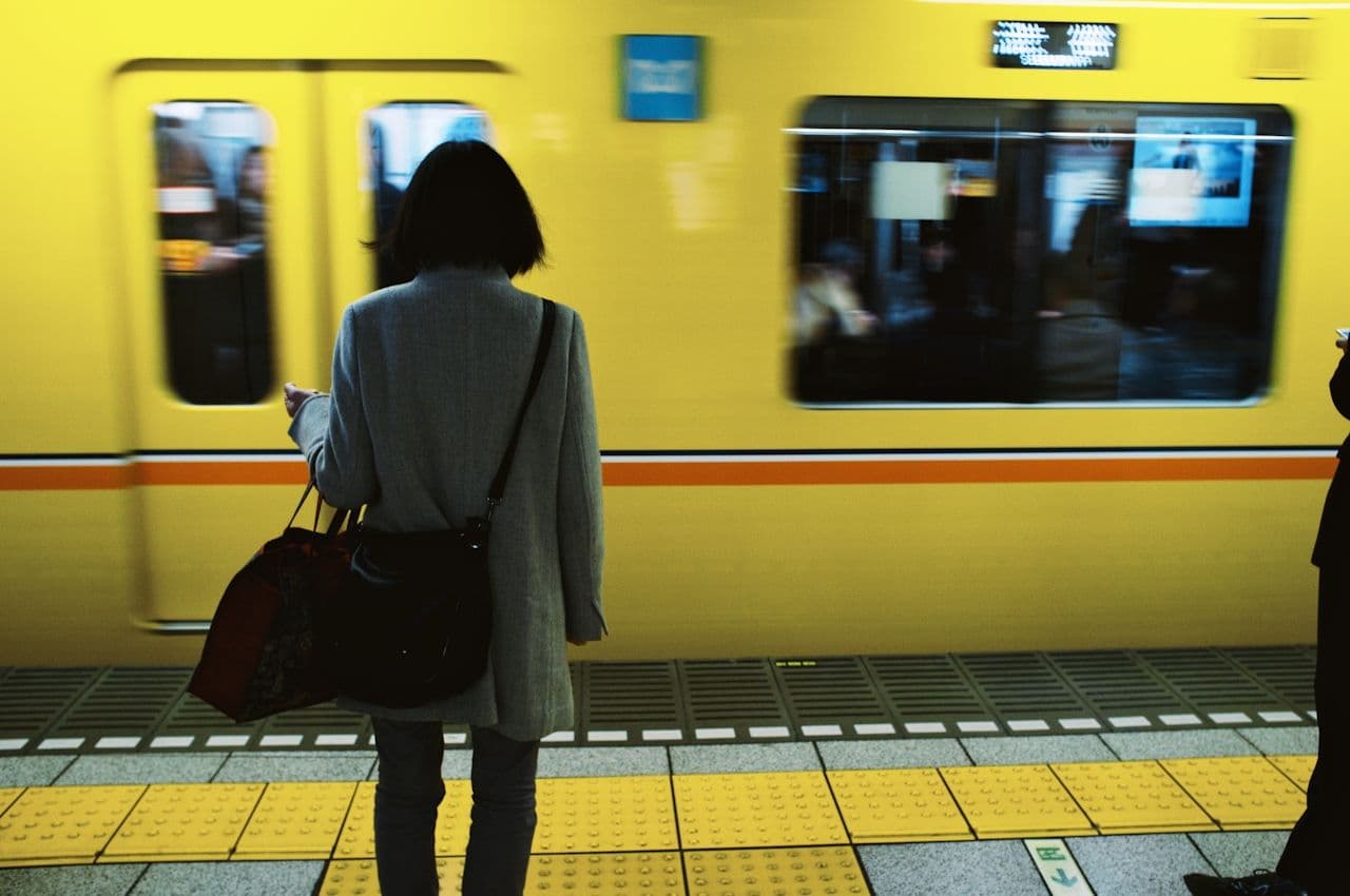 woman on a yellow train